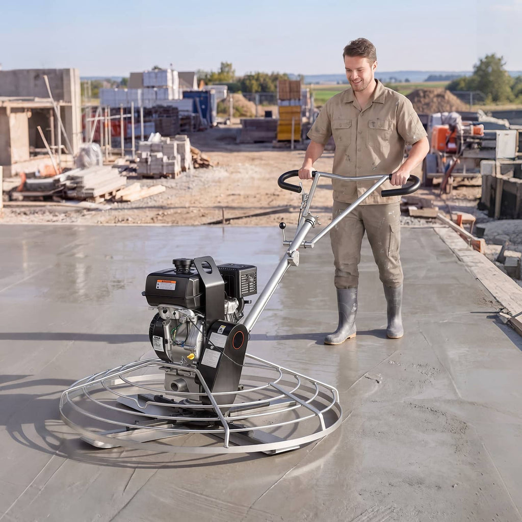 Gas concrete power trowel in use on concrete slab with operator holding handle