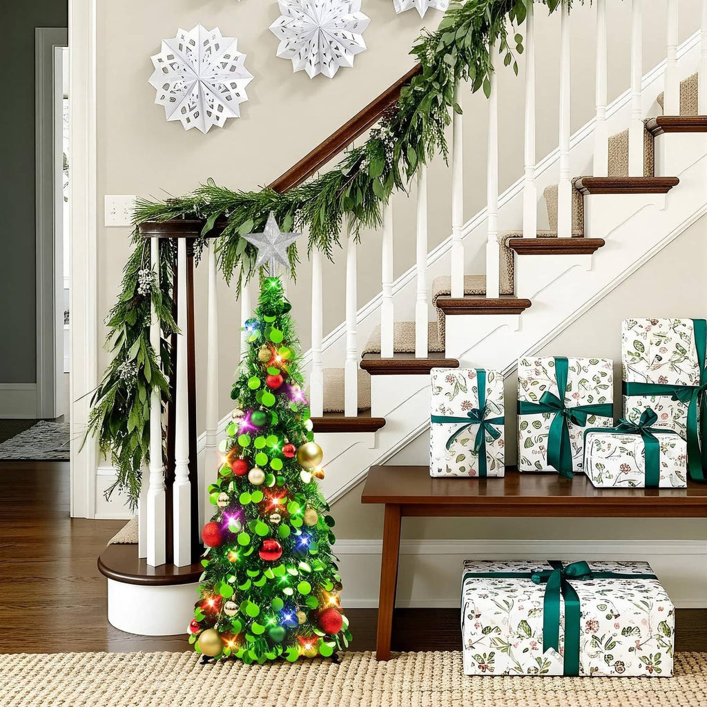 Green 3ft tinsel Christmas tree with silver star topper, multicolor LED lights and bauble decorations