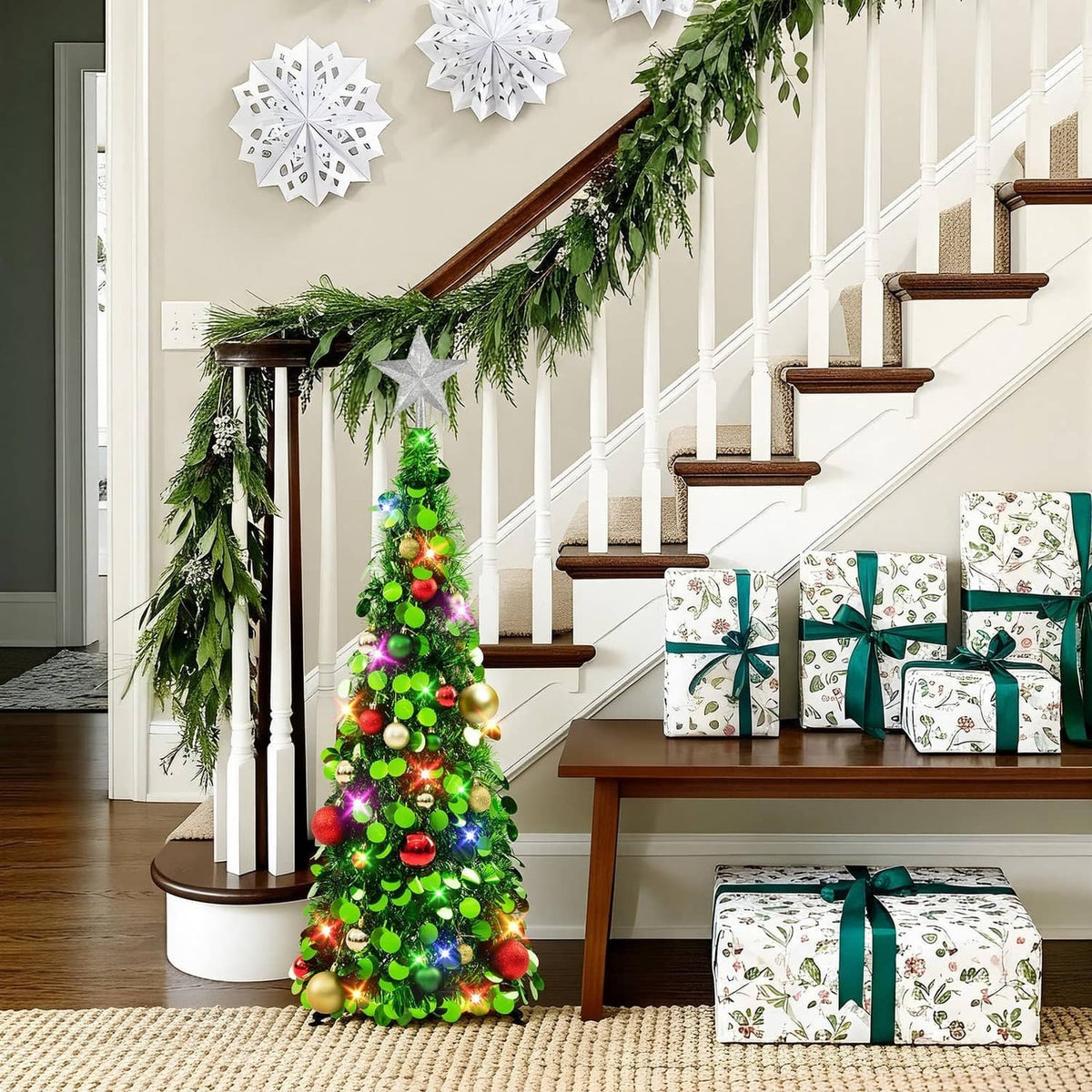 Green 3ft tinsel Christmas tree with silver star topper, multicolor LED lights and bauble decorations