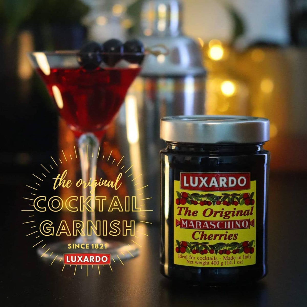 Luxardo maraschino cherries jar beside a cocktail glass