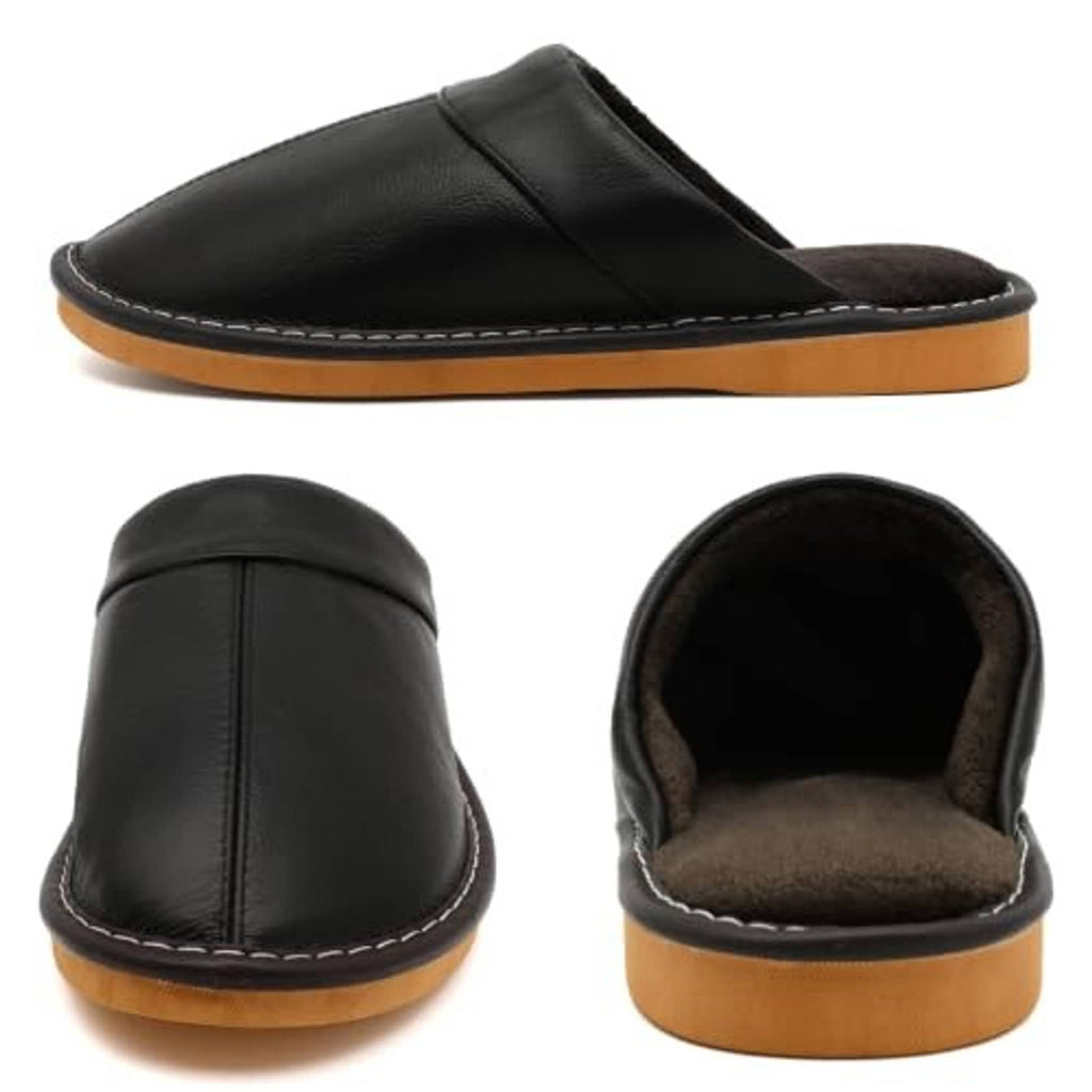 Black leather mule slippers with fuzzy lining, stitched edge, and tan base sole