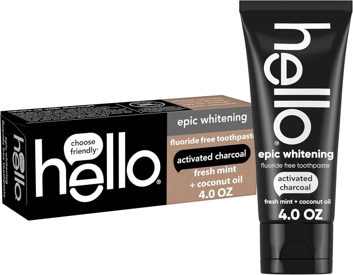 Toothpaste box with charcoal tube, both featuring black and tan details