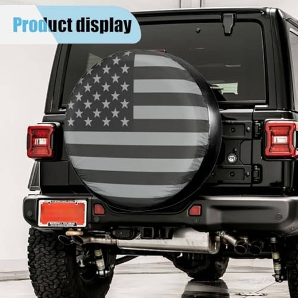 American flag spare tire cover on a vehicle rear with round black trim