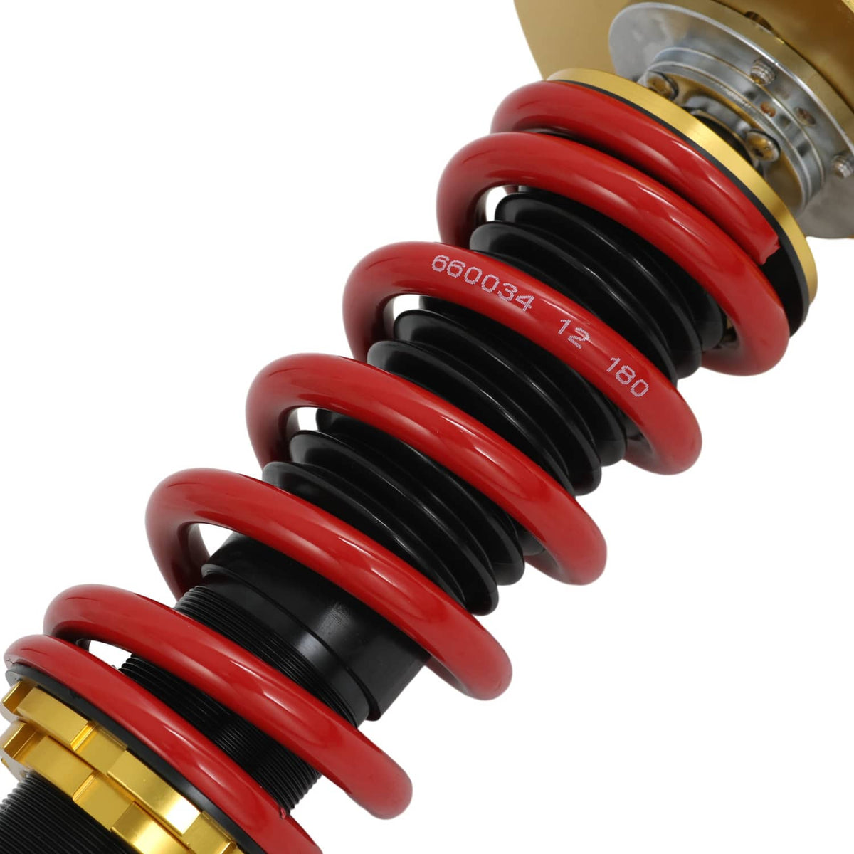 Red coil springs with black sleeves and stamped measurement marks on coilover