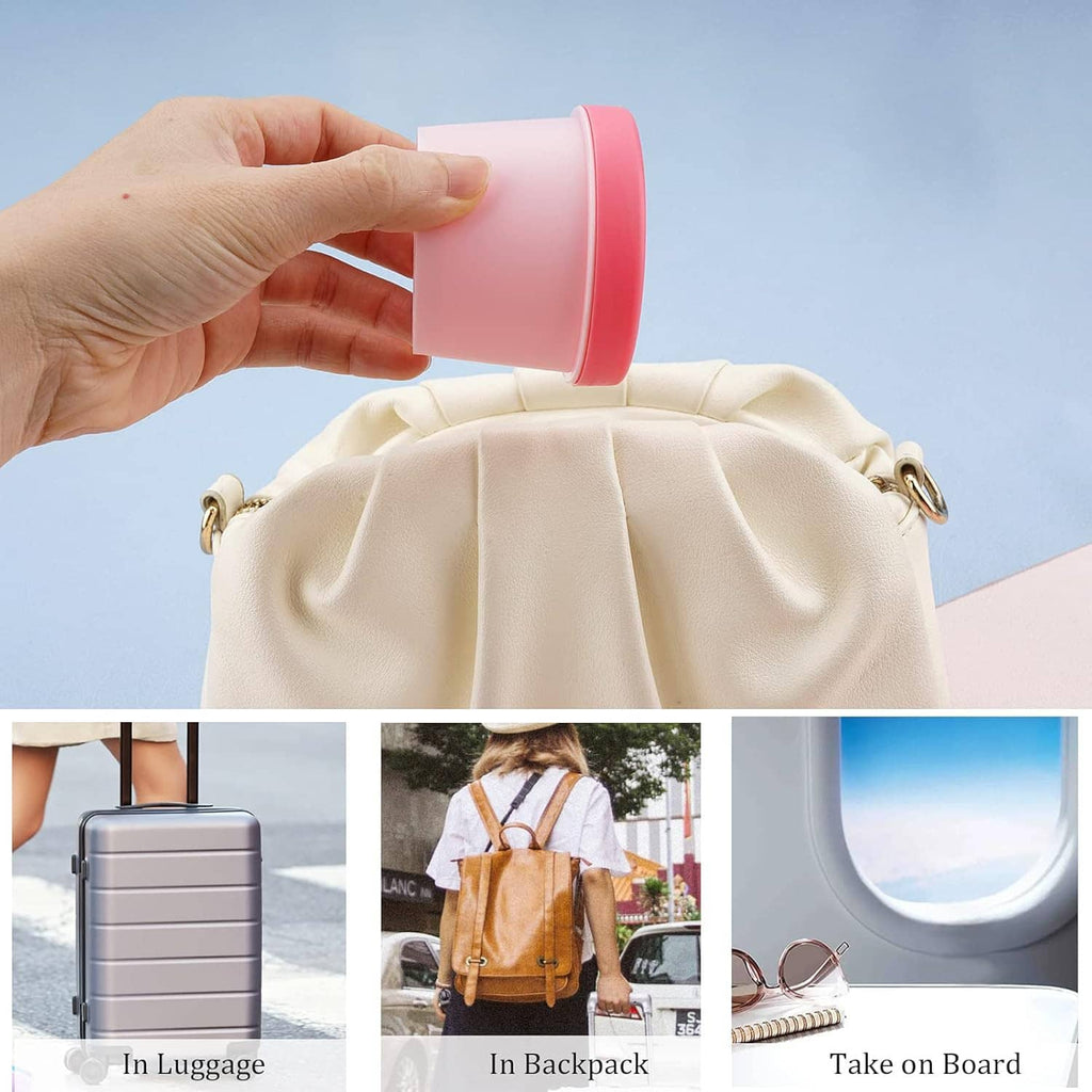 Pink empty plastic cosmetic jar held in hand, travel-size refill pot with lid