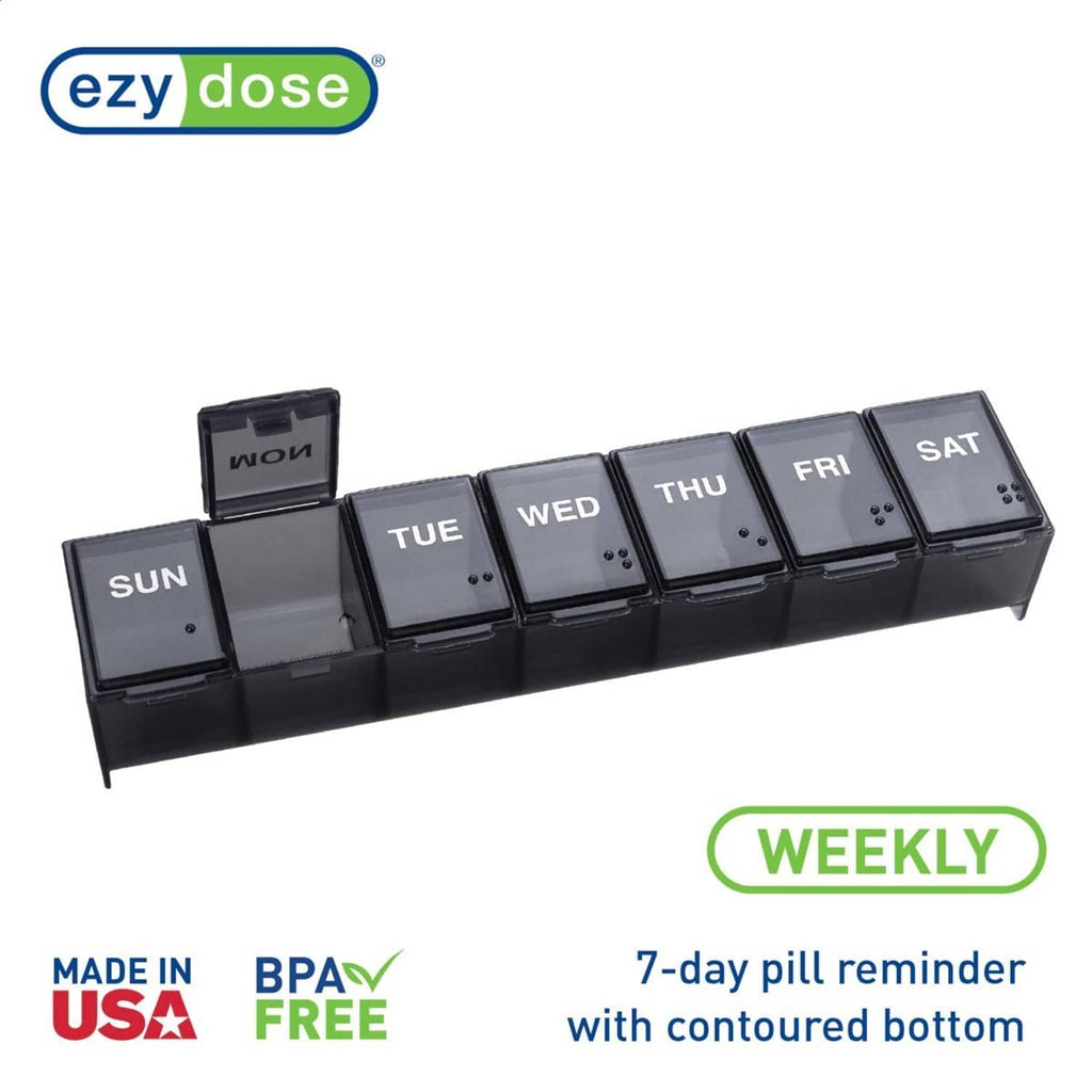 Weekly 7-day pill case with dark hinged lids labeled Sun to Sat