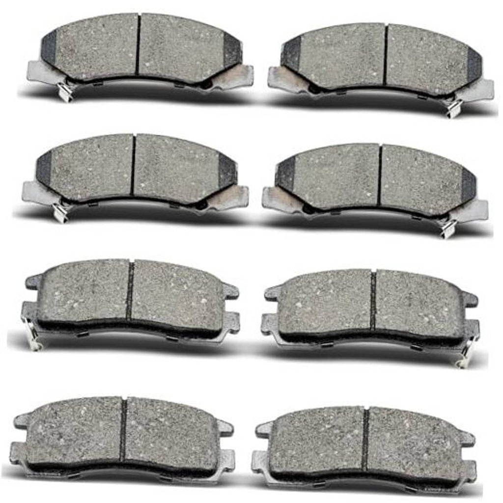 Set of gray ceramic brake pads with metal backing, front and rear pieces shown
