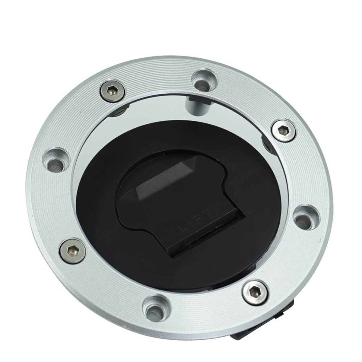 Silver ignition lock cap with black center key slot and mounting screws