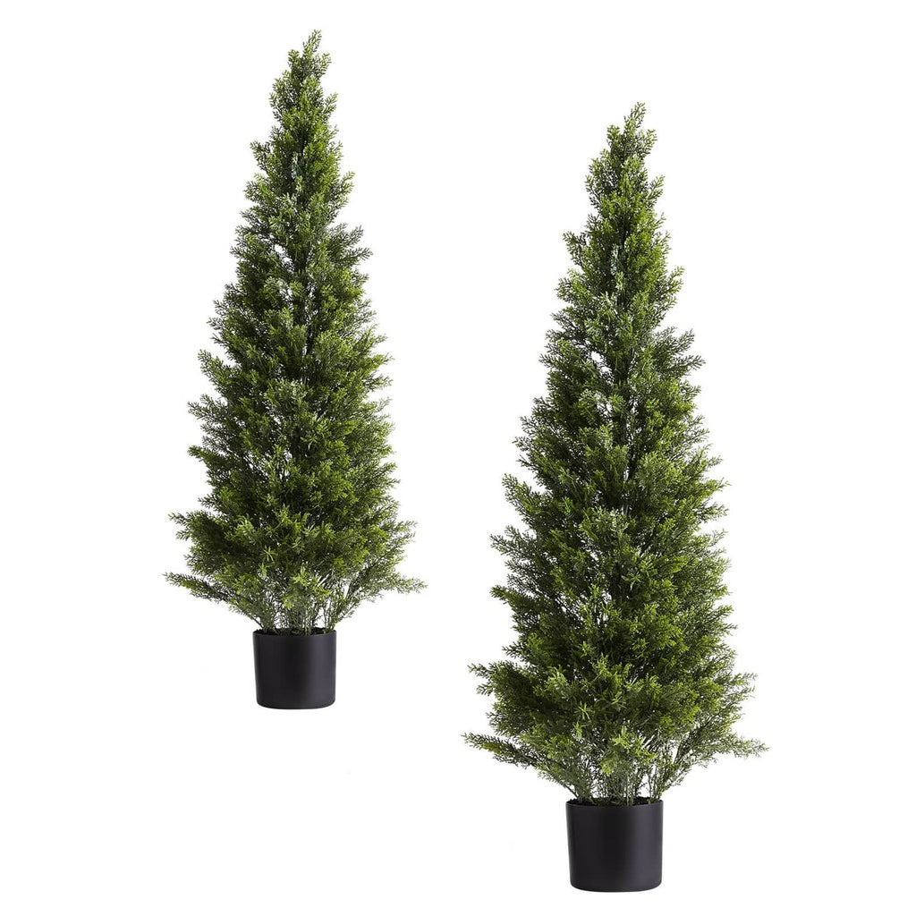Artificial cedar-style topiary trees in black planters, two compact green conical shapes