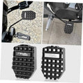 Black rear brake lever extension pedal with textured grip pad