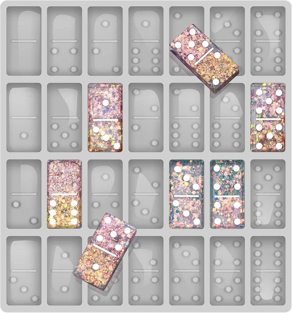 Gray jumbo domino silicone mold sheet with glitter resin domino pieces in cells