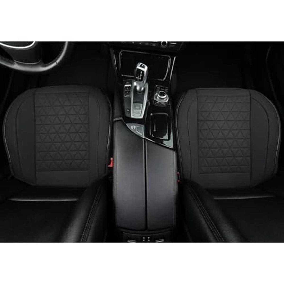 Black car seat cover pair with triangular quilt pattern on both front seats.