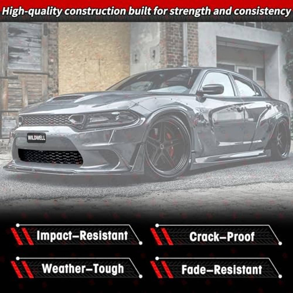 Front bumper grille on white car with black honeycomb mesh and oval openings