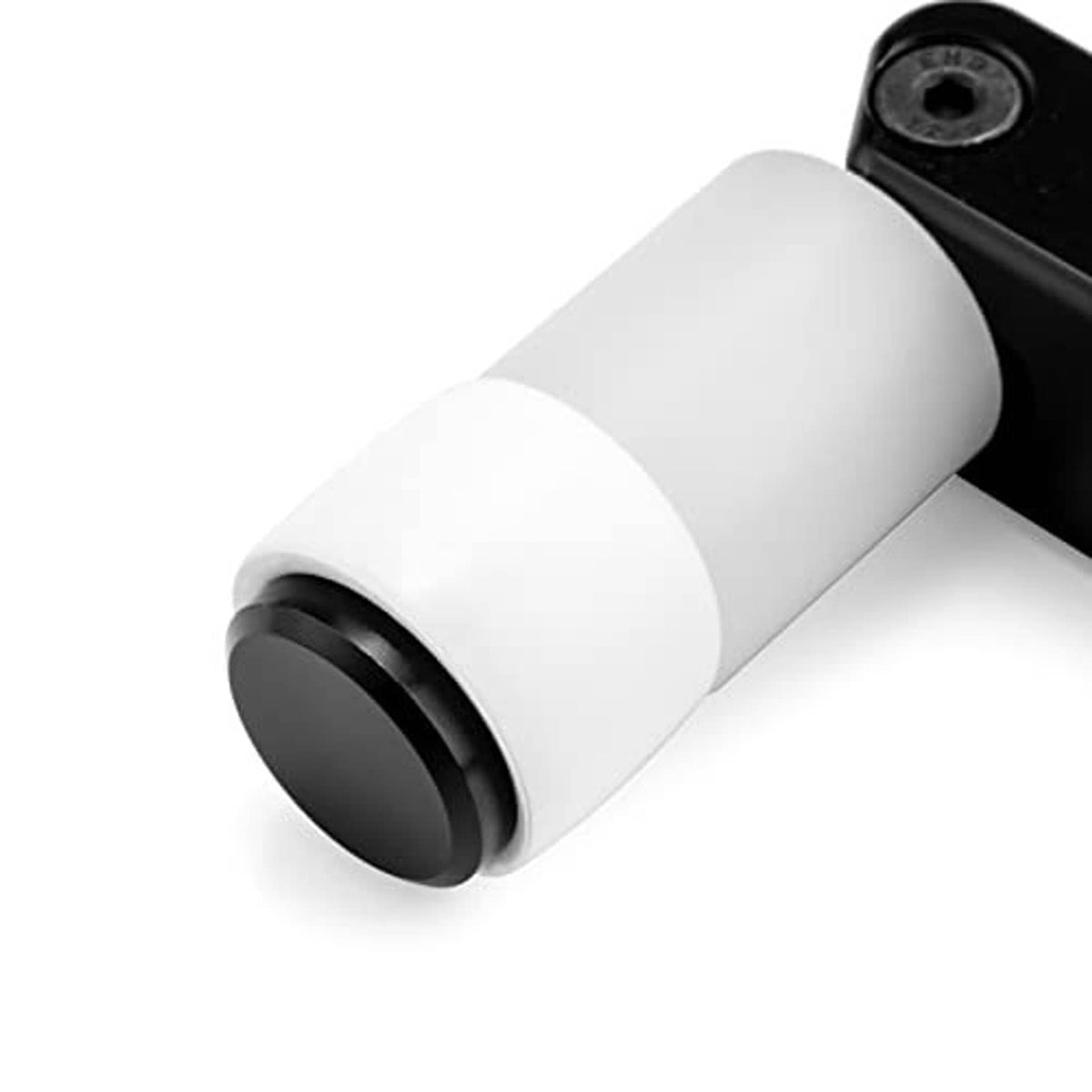 Close view of white cylinder actuator with black latch bracket edge