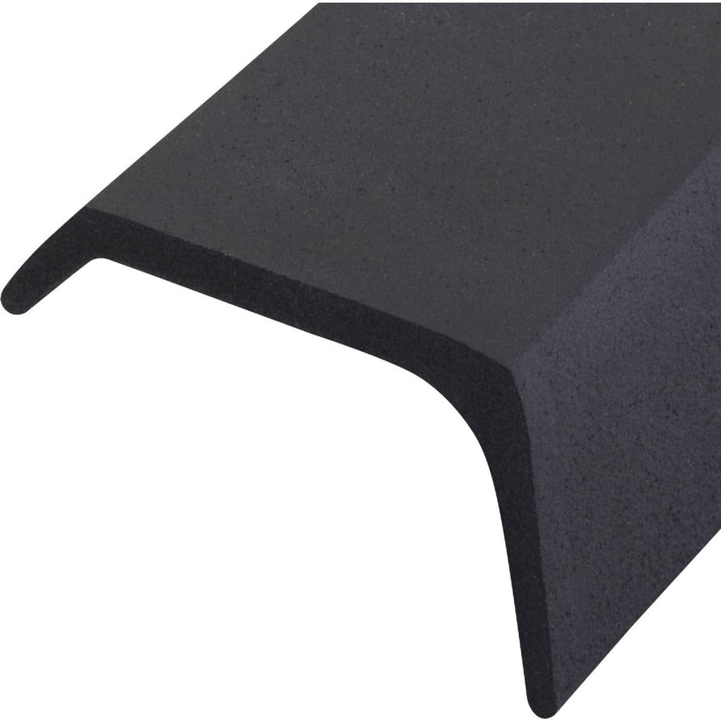 Close-up of black rubber garage door bottom seal profile with sealing flap