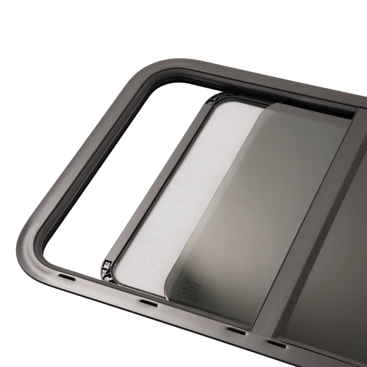 RV window horizontal slider with tinted glass panels and close-up of divider frame