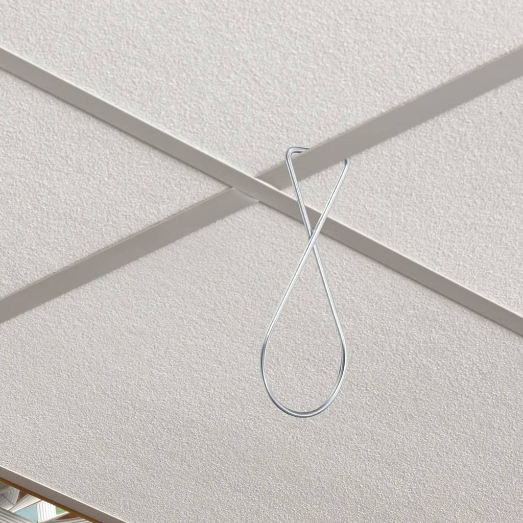 Silver ceiling hook clip attached to a drop ceiling tile with curved loop