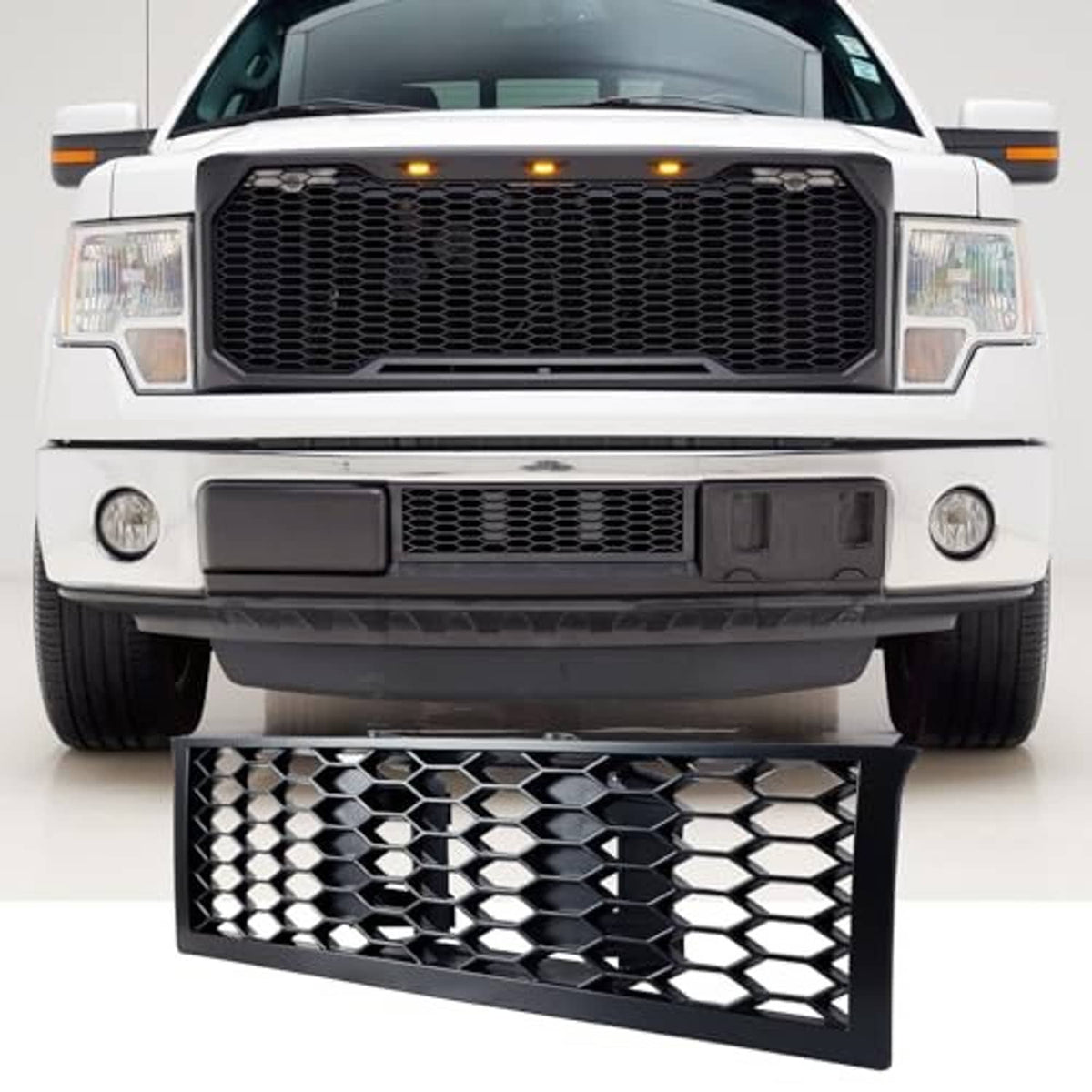 Front bumper lower mesh grille with black hex honeycomb design and silver highlights, rectangular
