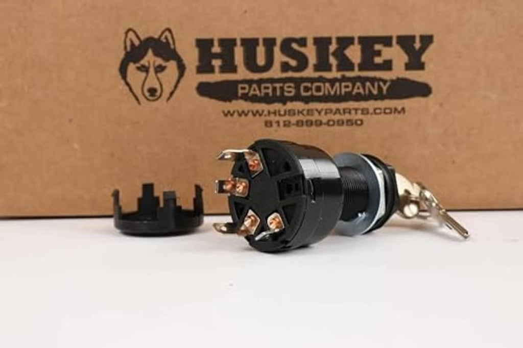 Golf cart ignition key switch with keys, showing prongs on black lock cylinder