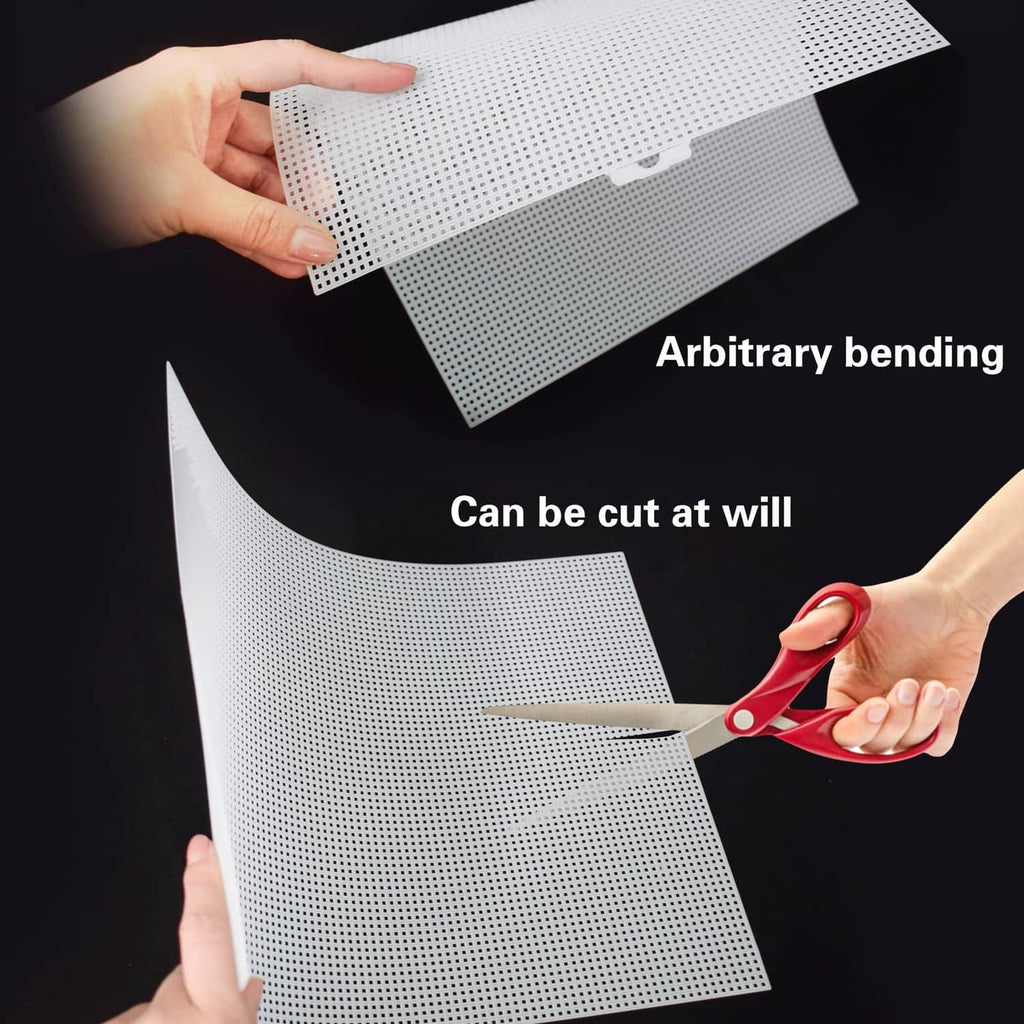 White perforated mesh aquarium divider sheet held by hand, suction cup tabs