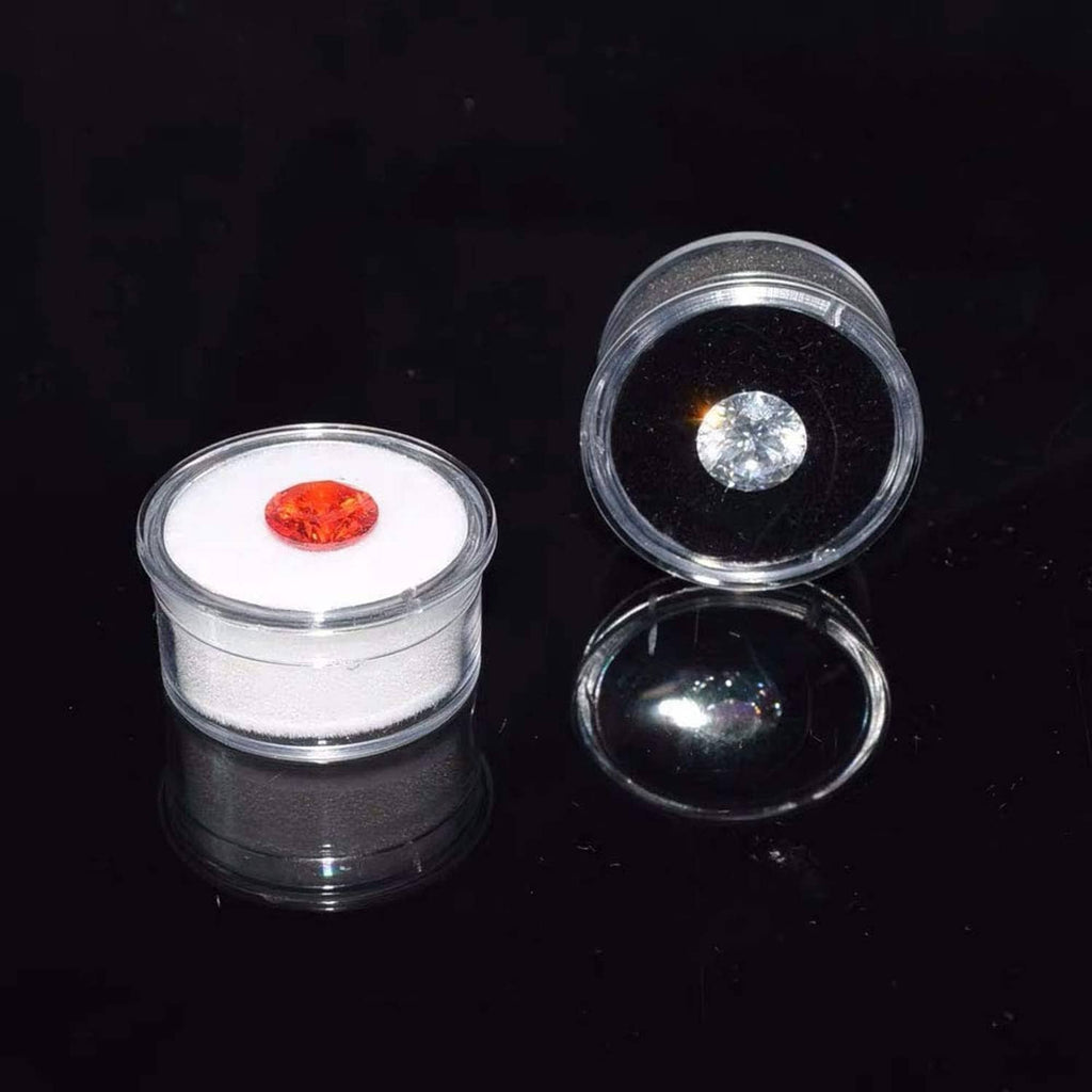 Clear round gemstone display boxes with red and light gem stones in foam