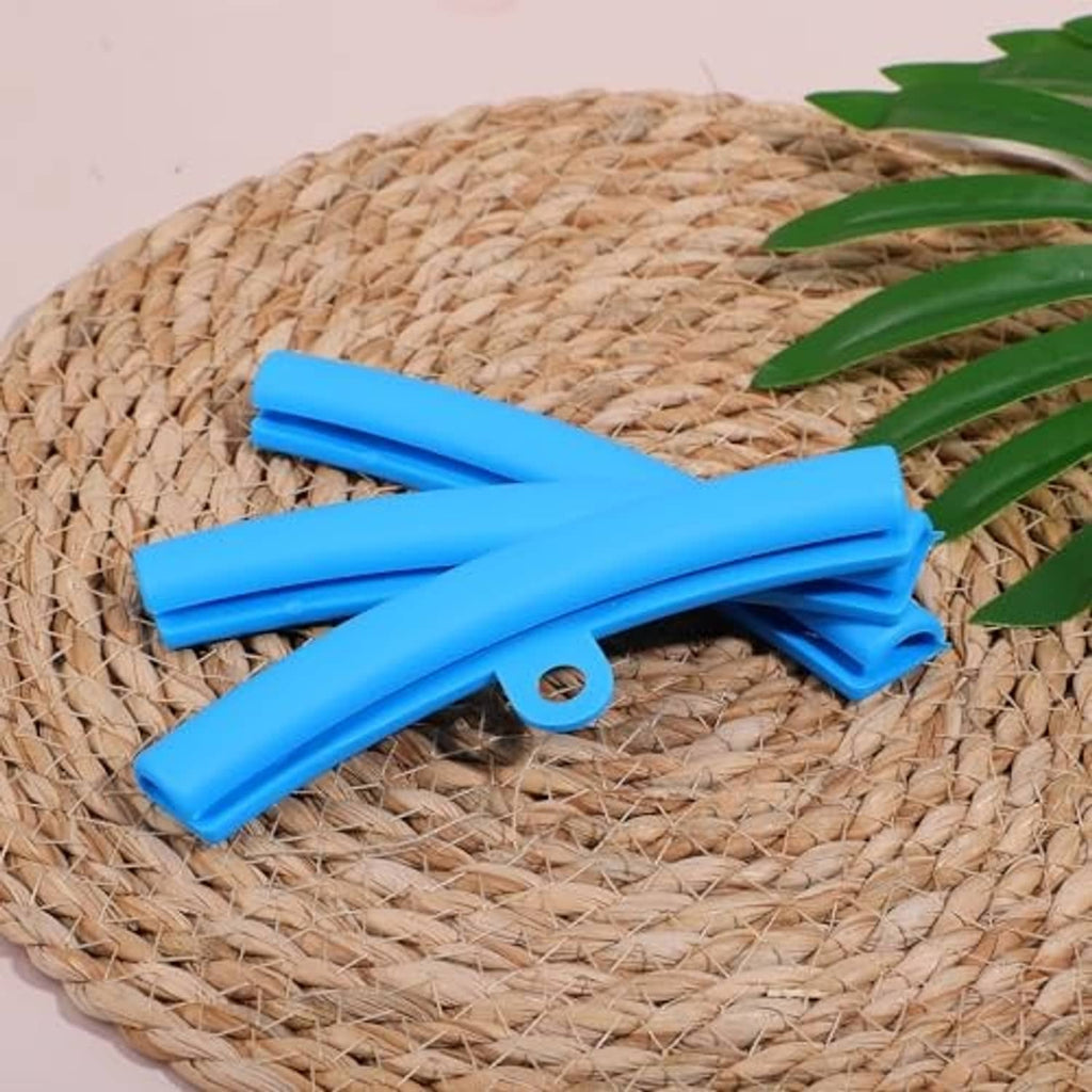 Blue rim protector sleeves with white tie cords, shown bundled together