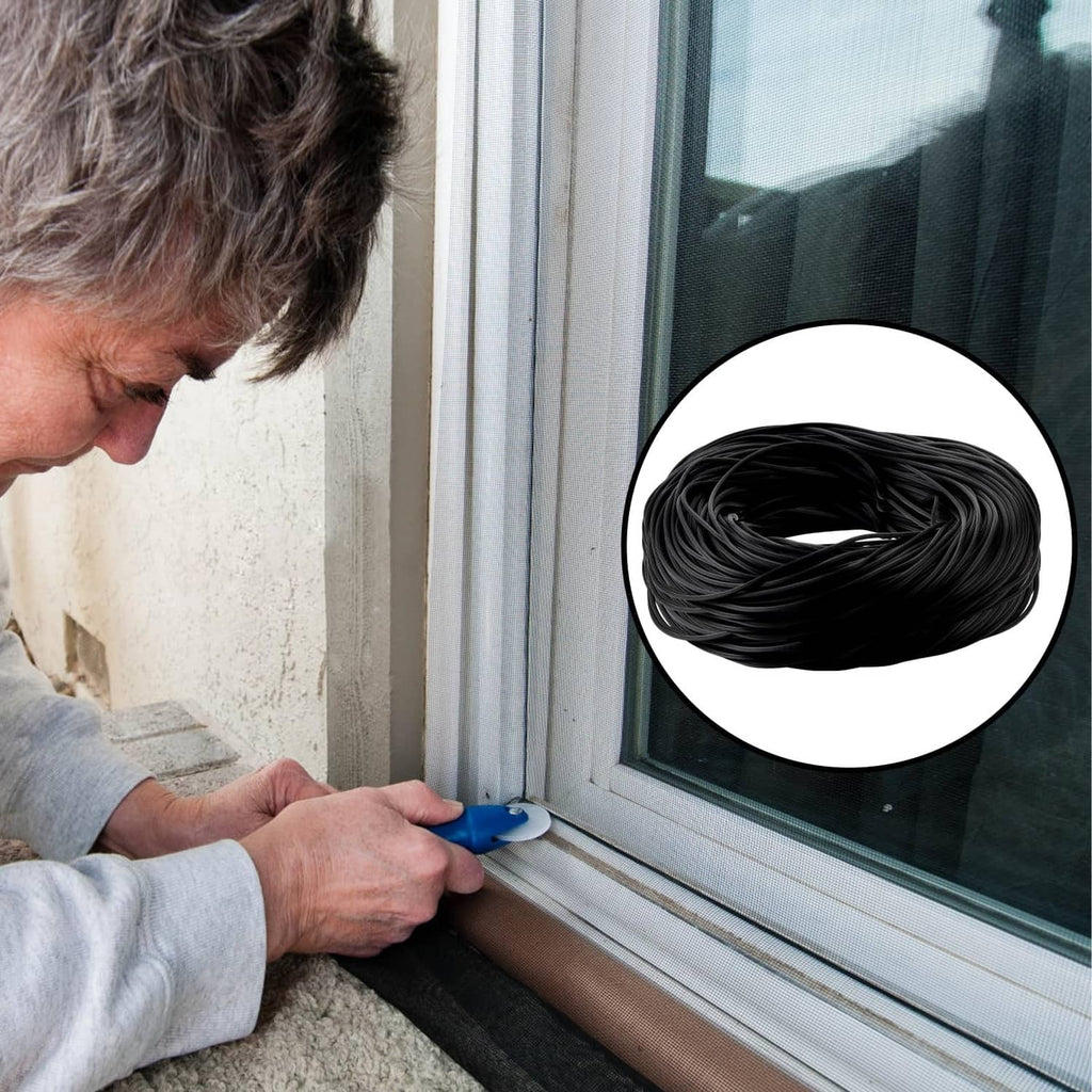 Black window screen spline pressed into window frame slot