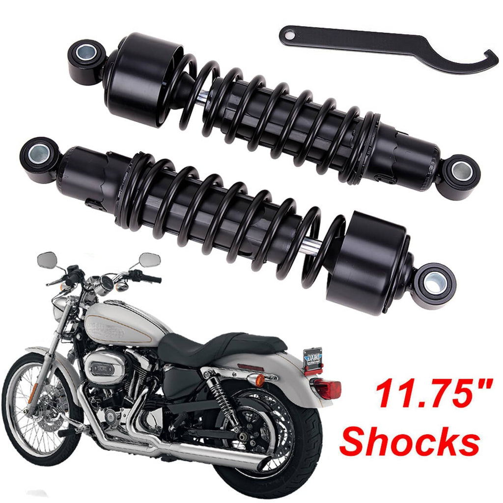 Black rear shocks pair with coil springs, eyelet mounts, and included installation tool