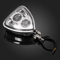 Triangular chrome motorcycle headlight with dual bulbs and black wiring harness, bottom mount.