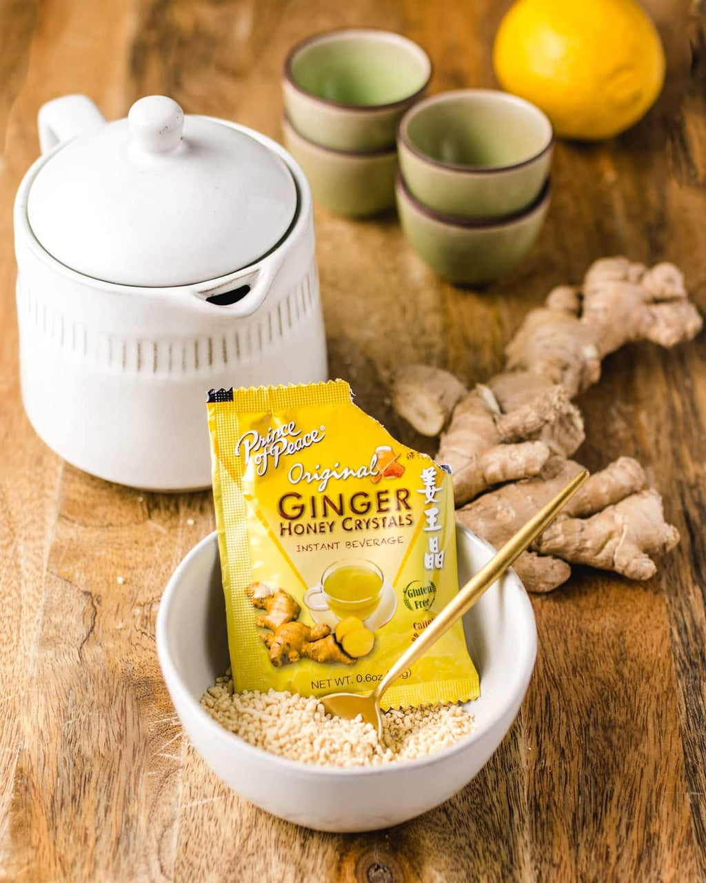Ginger honey crystals sachet packet over crystal powder in a bowl