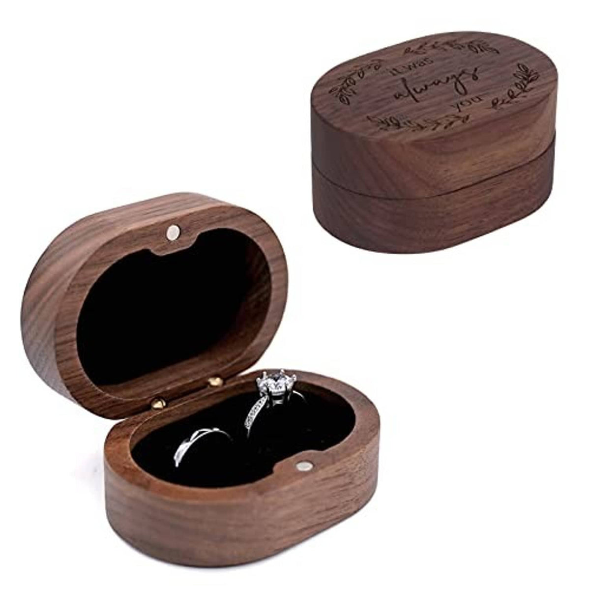 Wooden ring box with hinged lid, open black interior, holding two rings on cushion