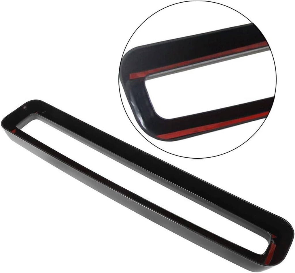 Black grille insert trim with red inner stripe, long rectangular opening design