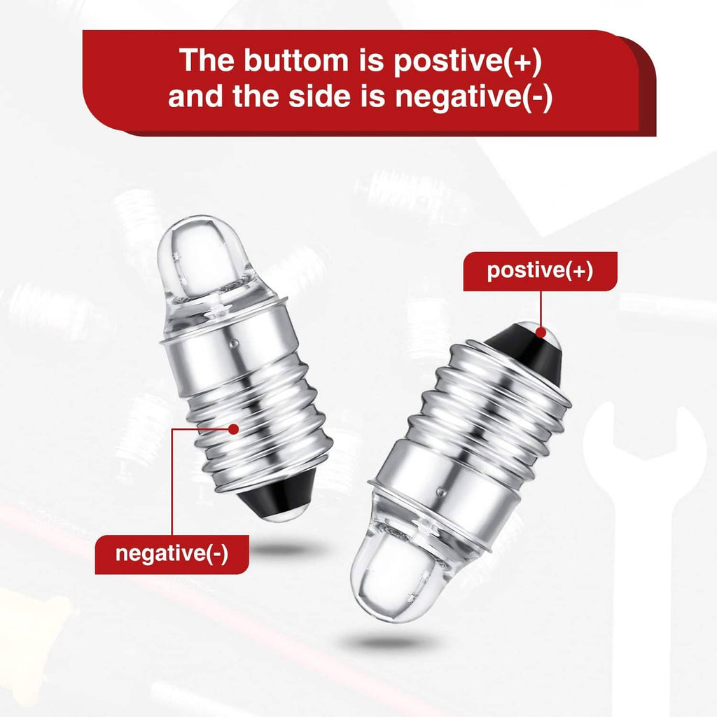Two mini E10 LED flashlight bulbs showing polarity ends, clear lens, silver screw base