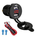 Black dual USB car charger with red digital volt display and cable terminals