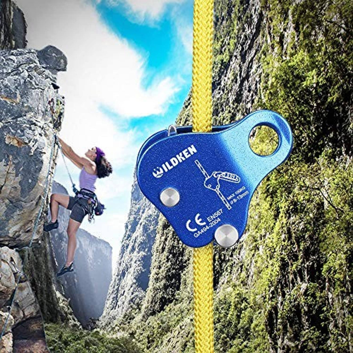 Blue ILDKEN rope grab belay device clipped to yellow rope on a rock wall