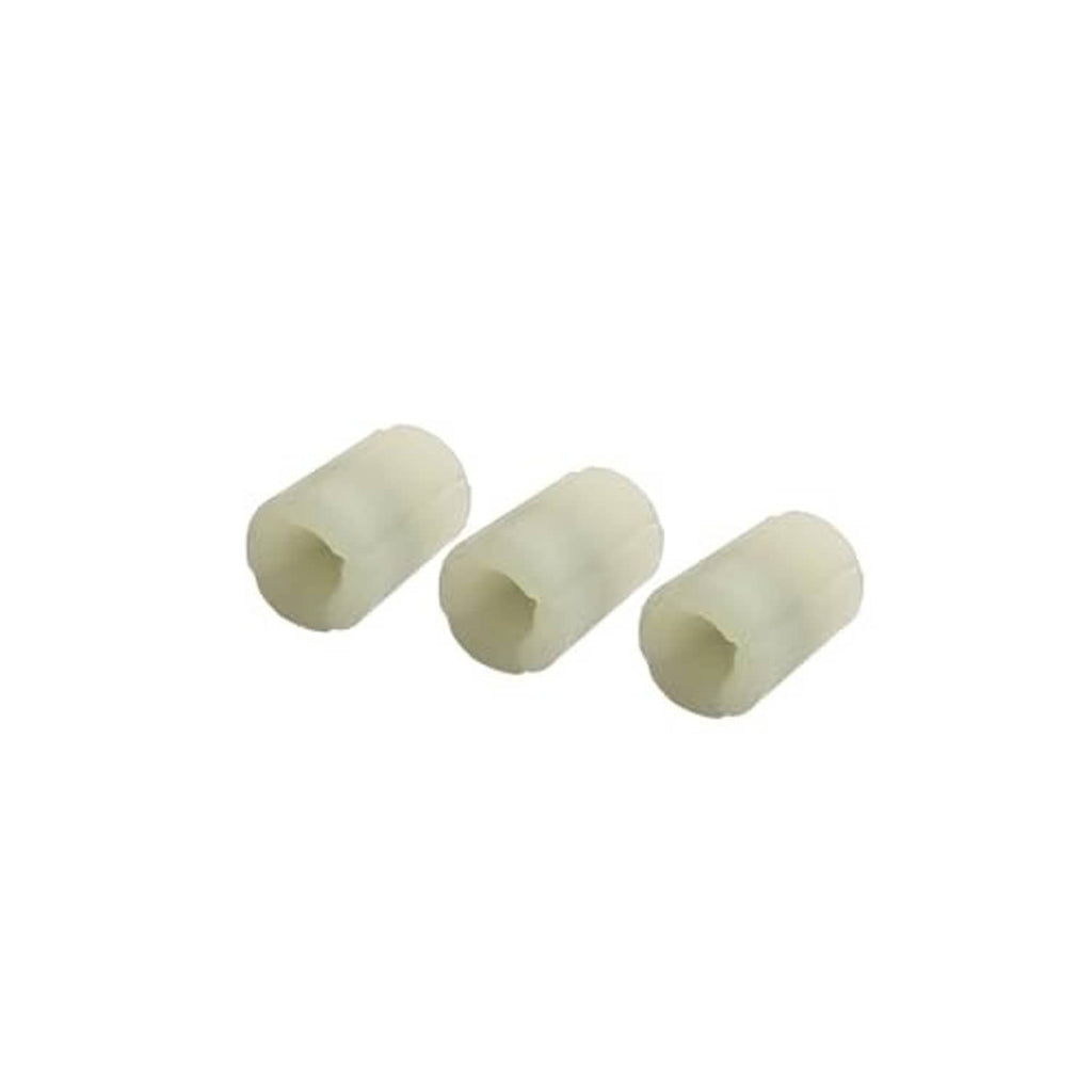 Three light-colored plastic bushings for transmission shifter rebuild set