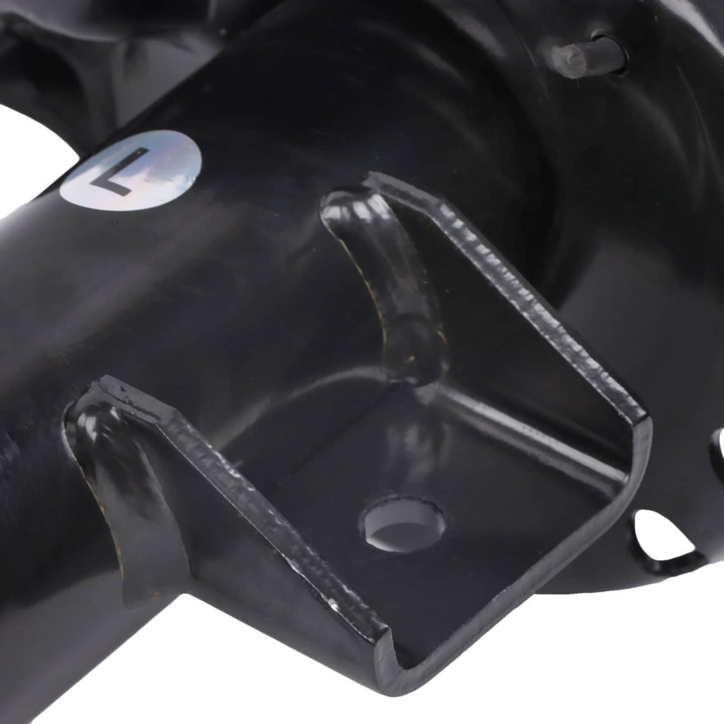 Front shock absorber strut top bracket with mounting holes and black metal finish.
