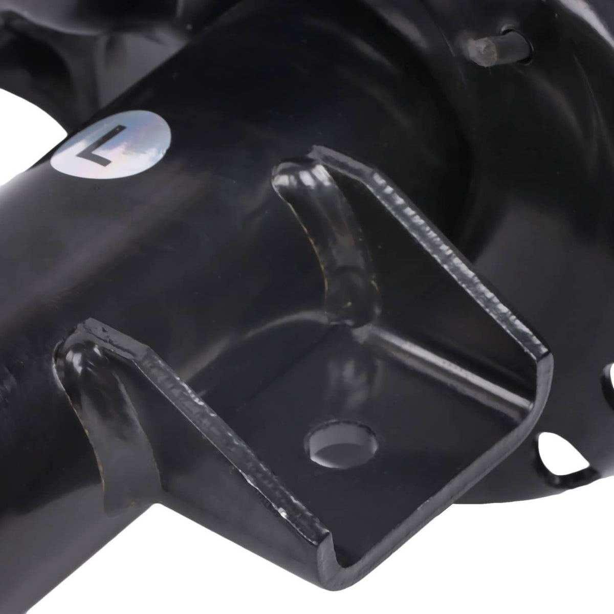 Front shock absorber strut top bracket with mounting holes and black metal finish.