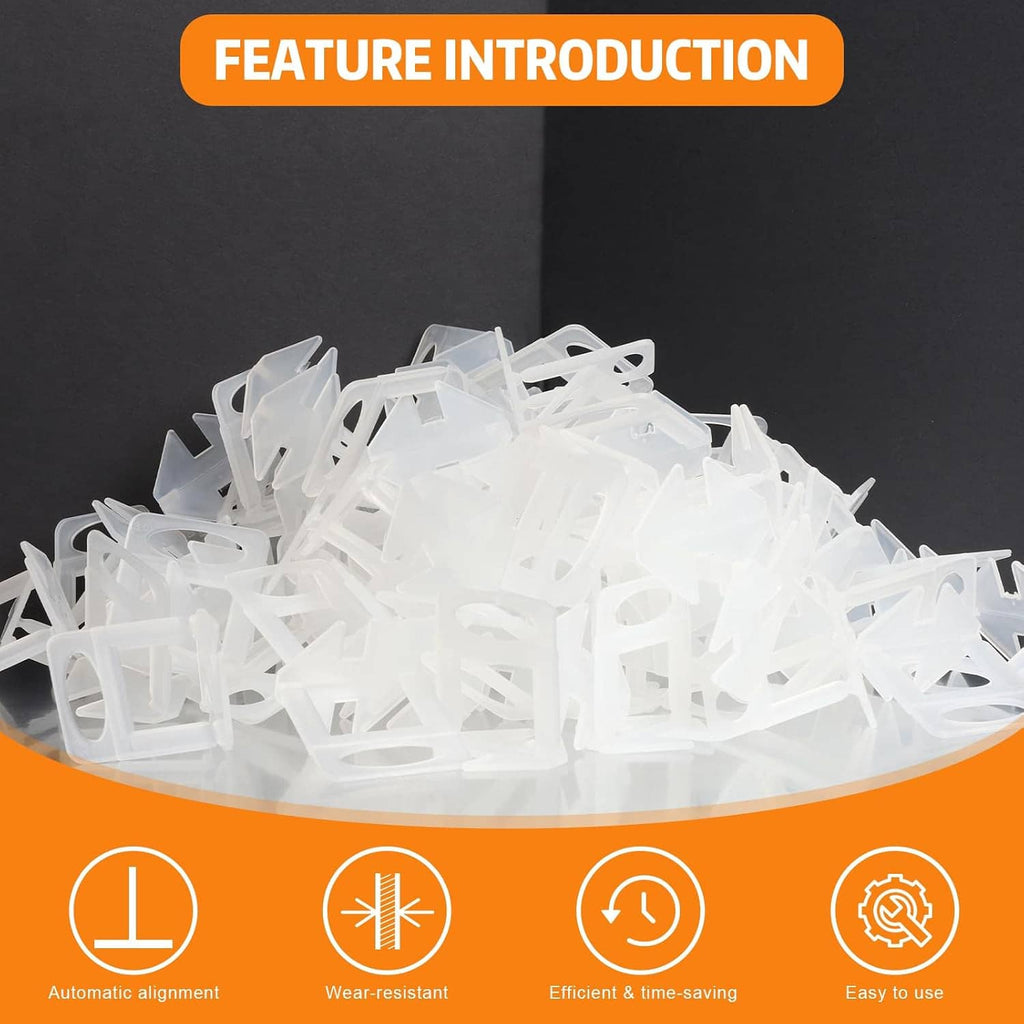 Large pile of white tile leveling spacers clips with base plates for tile installation