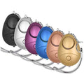 Multi-color personal security alarm keychains with key rings and pull cords.