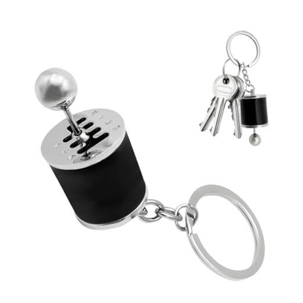 Six-speed gearbox keychain with black fob, silver ball, and metal keyring with keys