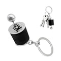 Six-speed gearbox keychain with black fob, silver ball, and metal keyring with keys
