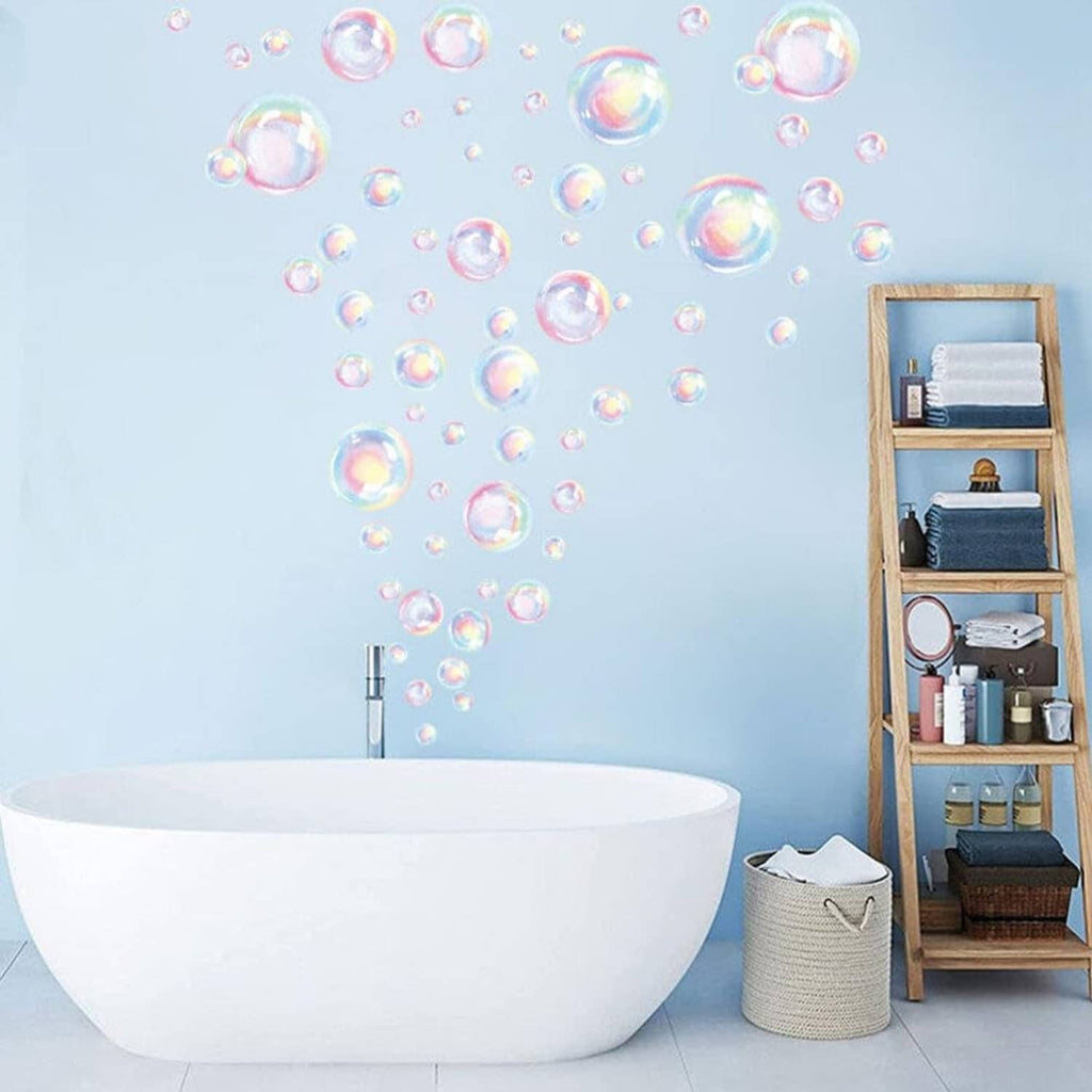 Rainbow bubble wall decals with iridescent bubbles across the wall above a white tub