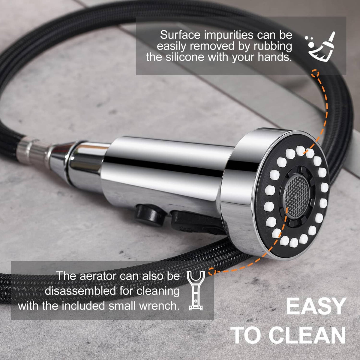 Chrome spray head with black perforated face and removable aerator for cleaning