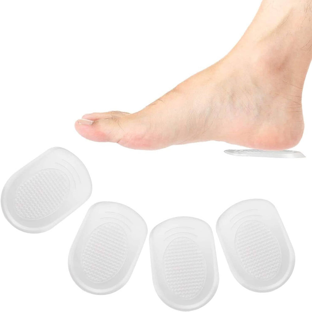 Silicone gel heel cups set: four white inserts beside a bare foot