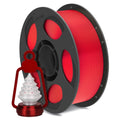 Red PLA silk filament spool with small decorative 3D-printed holiday pieces