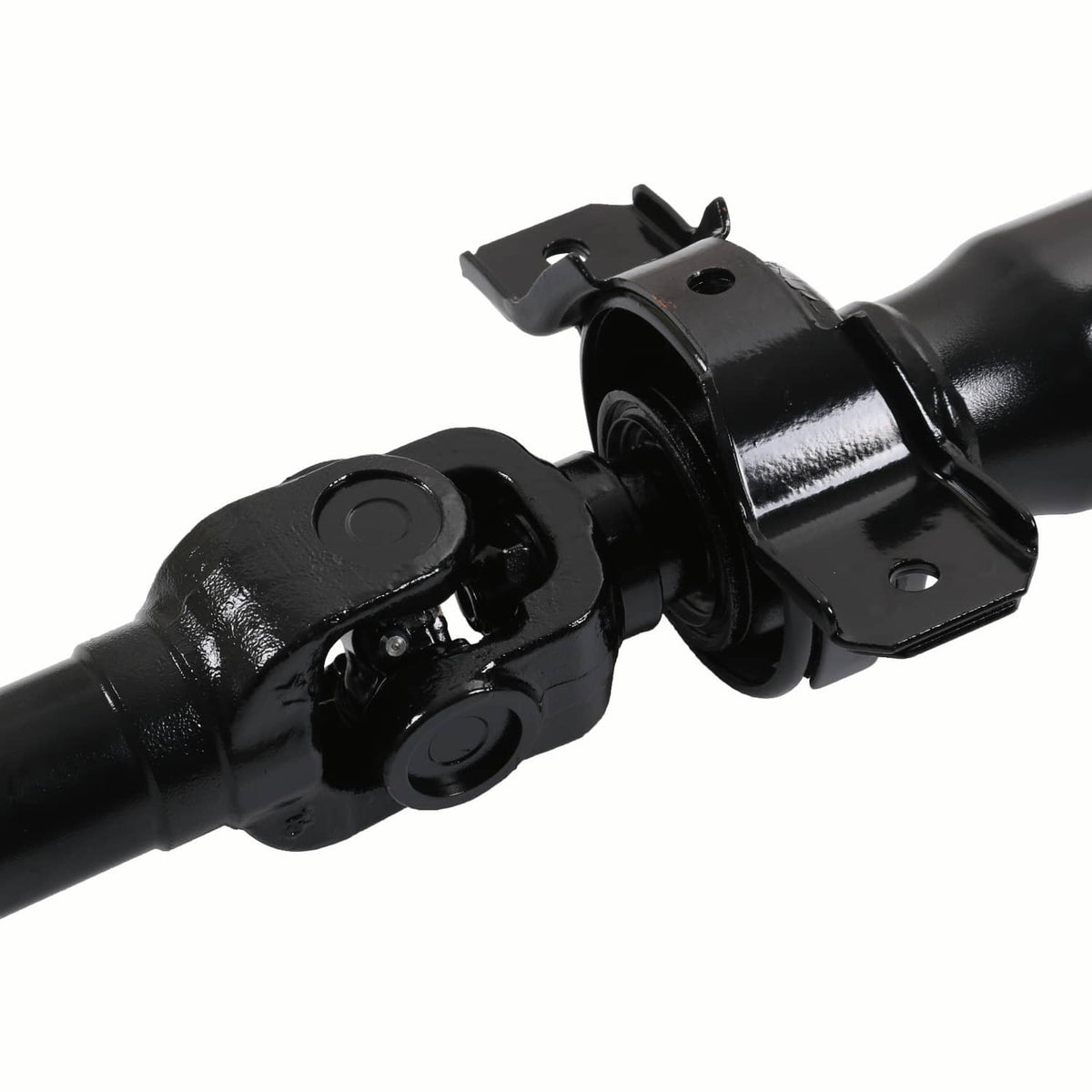 Close-up of black rear driveshaft prop shaft universal joint and mounting bracket