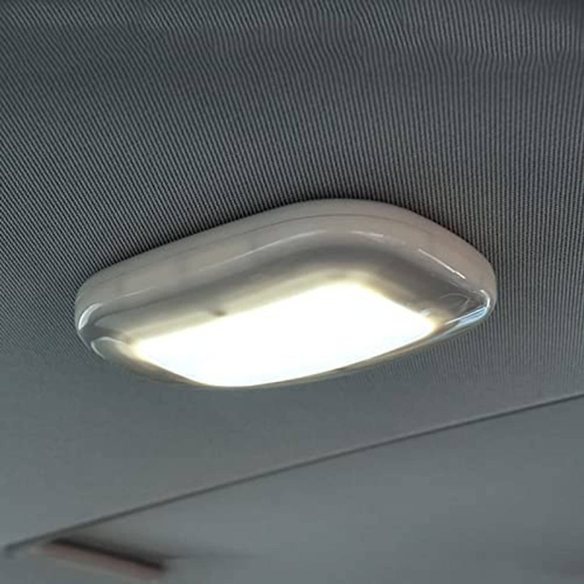 Car interior LED light dome with translucent white face, steady bright illumination