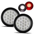 Set of round LED trailer lights with black housing, white backup and red stop/turn LEDs