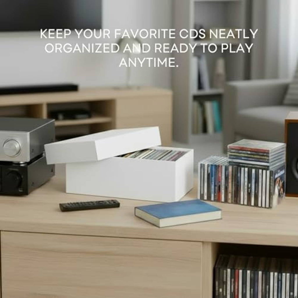 White cardboard CD storage boxes on a tabletop, one open with CDs inside